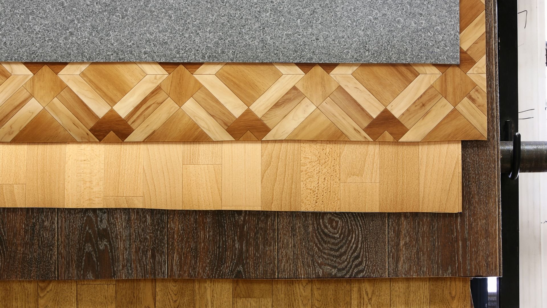 Wood samples showcasing different grain patterns and colors in flooring